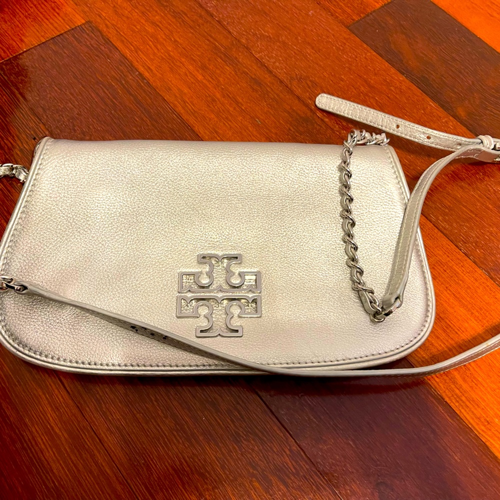 Silver Tory Burch leather convertible bag.